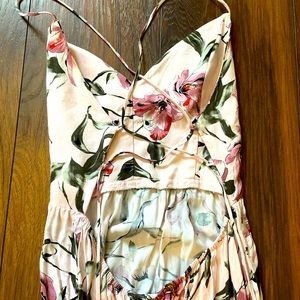 Pink floral maxi dress with slit up the side.